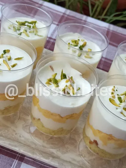 A tray of my Rasmalai Fusion dessert cups, ready to be served. This layered dessert is a unique twist on a classic Indian sweet.