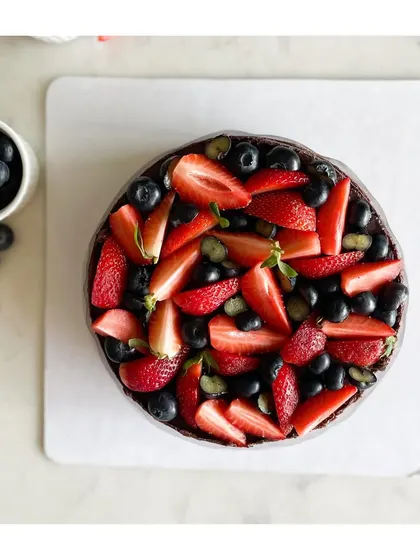 A top-down view of the Chocolate Berry cake, showing the beautiful arrangement of fresh fruit. It's as beautiful as it is delicious.
