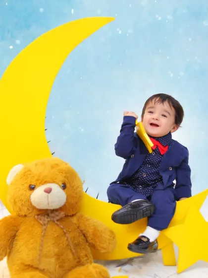 A sweet and simple studio shoot for a little one. Using cute props like a moon and teddy bear, I create adorable portraits that capture the innocence of childhood.
