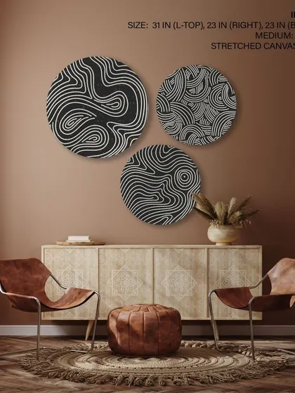 This set of three circular stretched canvas prints features minimalist, Japanese-style line patterns. The intricate black and white designs create a mesmerizing and modern graphic statement.