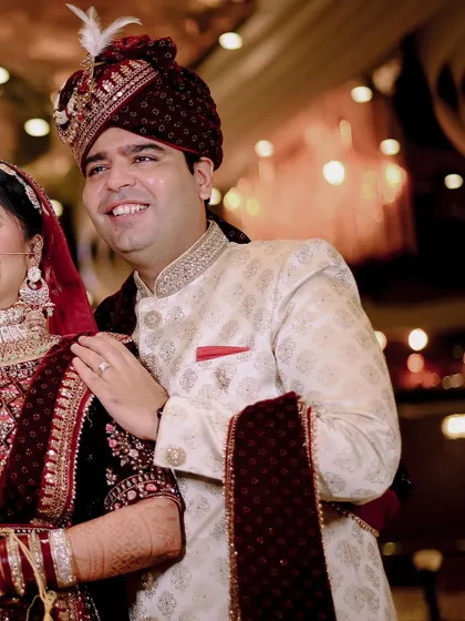 A happy, candid portrait of the couple on their wedding day.