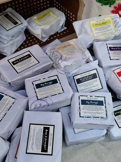 Soaps all wrapped and ready to go. I hand-wrap each bar in simple, eco-friendly paper with a clear label detailing the ingredients.