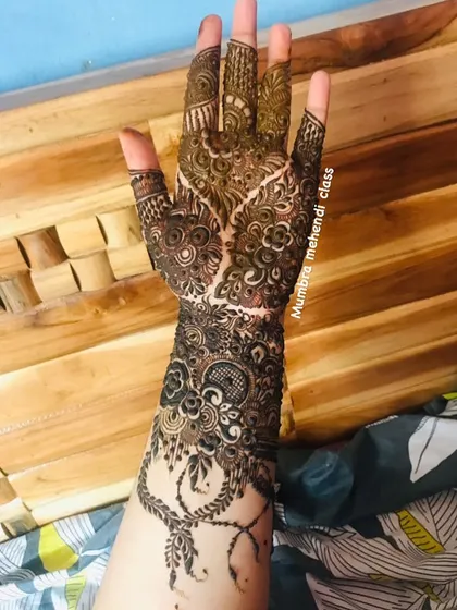 This cutwork design leaves parts of the skin exposed in a heart shape, creating a really unique and modern semi-bridal look.