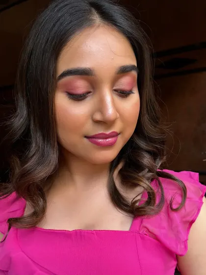 The texture of the eyeshadow and the soft glow on the skin are visible here. I focus on teaching techniques that create dimension and a healthy, radiant finish.