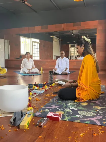Participants sit in quiet meditation as I prepare to start the sound bath. The setup includes a variety of instruments to create a rich, multi-layered soundscape for deep immersion.