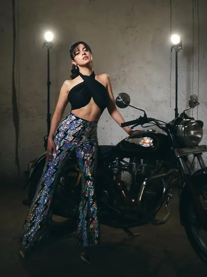 This series of shots captures the full biker-chic look I created for Divya Khosla Kumar's 'Yaariyan 2' promotions. The sequined jacket and pants by Any Old Iron paired with a simple black top created a cool, modern promotional style.