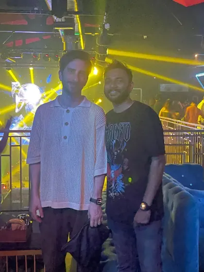 Posing with international artist Echonomist in a club filled with amazing light work. The whole vibe was on another level.
