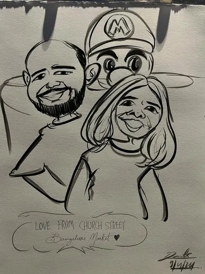 A duplicate of the Mario-themed couple's caricature.