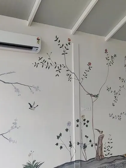 A wider view of the French mural, showing how it wraps around the room and incorporates elements like air conditioners.