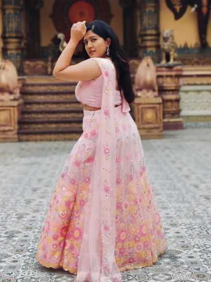 Actress Meghana Shankarappa looking lovely in a pink floral lehenga, which I styled with a simple yet elegant AD necklace set.