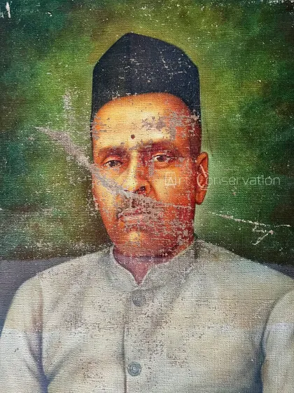 An example of a common problem I fix. This antique portrait from 1935 arrived at my studio with significant scratches and paint loss obscuring the face, a typical starting point for my restoration projects.