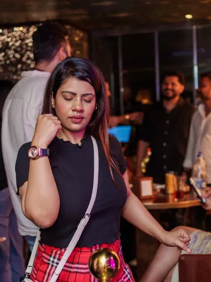 A guest feeling the groove on the dance floor, lost in the house music.
