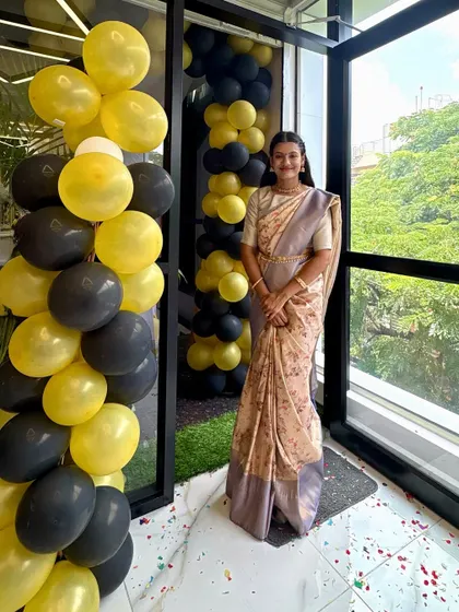 Standing proudly in my new studio on opening day. The balloons and confetti were symbols of the joy and excitement I feel about sharing my passion for yoga and dance with the Bangalore community.