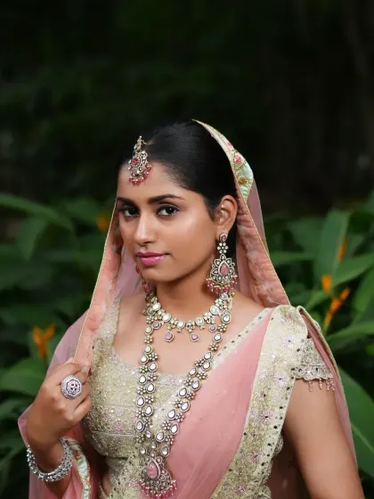 A beautiful portrait of the bride, her look perfected by the elegant Polki and Victorian-style jewellery.