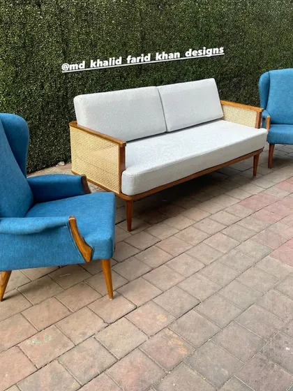 Another view of the full set, showing two wingback chairs and the sofa.