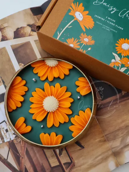 My popular Jasmine Daisy Urli is back in stock. This piece, with its bright orange daisies on a deep green base, comes beautifully packaged and ready for gifting.