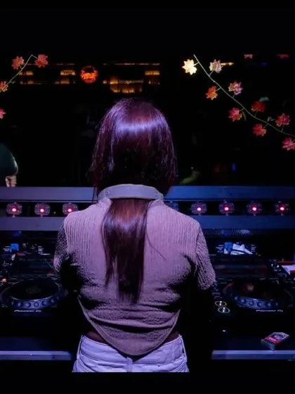 A shot from behind, showing my perspective of the decks and the club. This is my command center for the night.