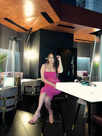 Excuse me miss, you've just been upgraded. Celebrating in style with a hot pink dress for a birthday night out.