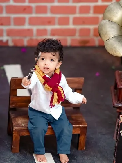 Wingardium Leviosa! Our Harry Potter theme is a hit with fans, featuring a magic wand and vintage props for a spellbinding shoot.