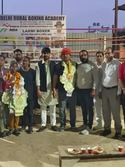 The entire academy and local supporters gather to celebrate a student's victory. These moments of community celebration are a huge motivation for all my athletes.