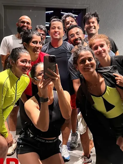 A post-workout group selfie. This is what our community is all about: sweat, smiles, and support.