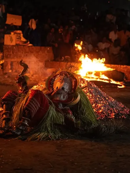 A series capturing the different stages of the Pottan Theyyam ritual, from the performer lying on the embers to being tended to by assistants. These images show the intensity and devotion involved in the all-night ceremony.