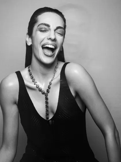 Another candid, laughing shot in black and white. It shows that a great skin-focused makeup look is beautiful in any light.