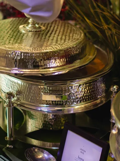 A close-up of our hammered silver chafing dish, showcasing the quality and elegance of our equipment. Even the functional elements of our service are chosen for their beauty.