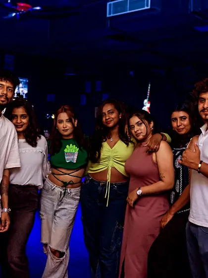 The cool blue lights of the dance floor create an amazing atmosphere for dancing and taking photos with your friends.