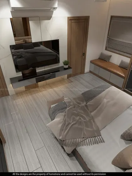 A master bedroom with a floating TV unit and a cozy window seat. The grey wood-look flooring and marble-finish wall panel add a touch of luxury.