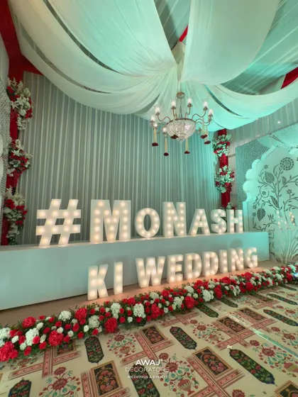 A close-up of the custom wedding hashtag sign, a modern and personal touch.