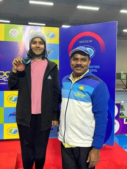 Pranavi with me after winning the bronze medal at the 66th National Championship.