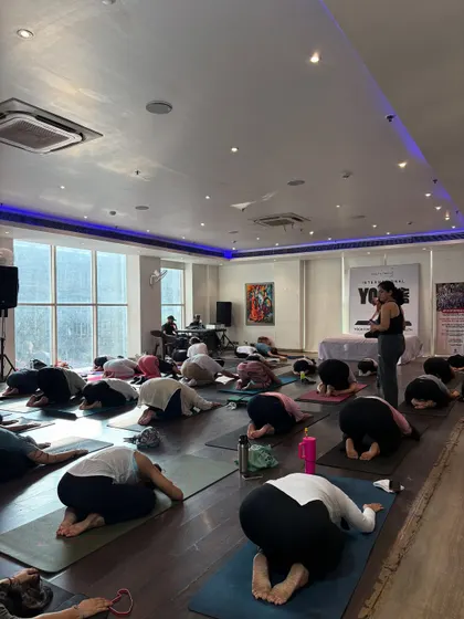 A moment of surrender in Balasana (Child's Pose) during our large-scale Yoga Day event. It was a day of connection and coming home to ourselves.
