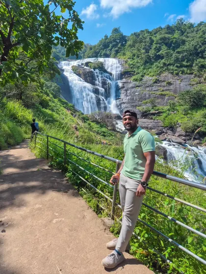 Enjoying the view of Mallalli Falls from the designated viewpoint. The trail to the falls is an adventure in itself.