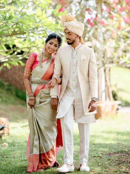 Sushma and her partner look picture-perfect in their coordinated wedding attire.