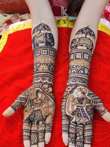 A close-up of the dandiya couple design, showing the fine details and shading that create a sense of movement.