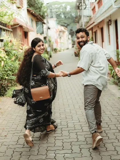 Anna and Freddy's playful run through the charming streets of Fort Kochi. This location provides a beautiful, vintage backdrop for a romantic couple shoot.