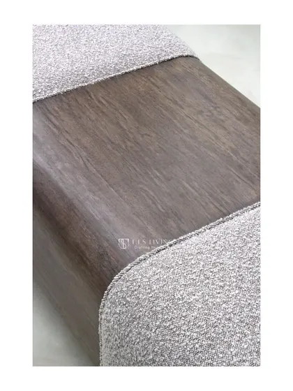 A detail shot showing the beautiful contrast between the rough, textured fabric and the smooth, warm wood grain.
