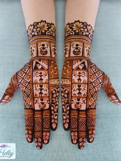 A beautiful example of Warli art integrated into a mehndi design. The simple, stick-figure-like humans and animals create a unique and culturally rich pattern.
