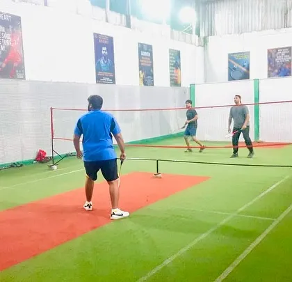 A doubles game with everyone in position, anticipating the next move from the opponent.