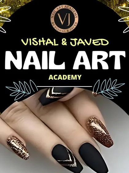 An inspiration alert featuring stunning black and gold nail art. This design combines a matte black base with textured gold foil and sharp chevron lines for a luxurious and edgy look.