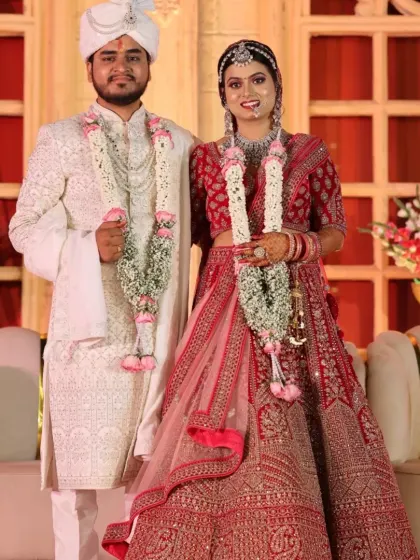 Here is the happy couple on their wedding day. I provided makeup services for both the bride, in her stunning red lehenga, and the groom, in his elegant white sherwani, ensuring they both looked flawless.