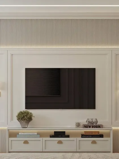 A classic and symmetrical TV unit design featuring traditional wall paneling and elegant fluted details. The integrated wall sconces and warm backlighting add a touch of timeless sophistication.