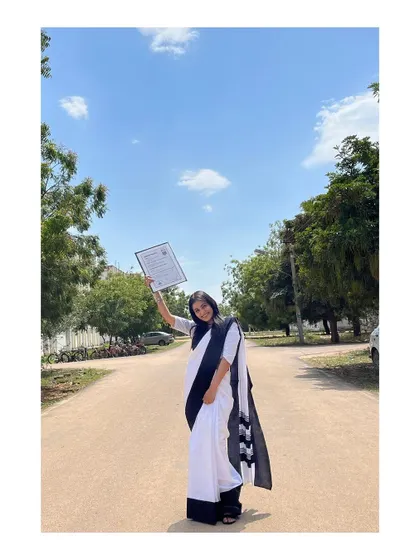 Holding my degree high during my 2022 convocation. This certificate represents years of study and the qualification I use to defend your rights in the digital world.