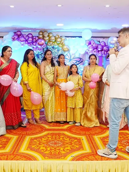 A balloon game for the ladies at a baby shower. It's a simple way to break the ice and get everyone laughing.