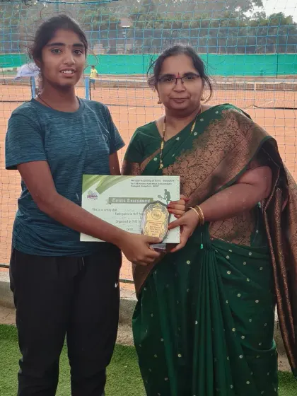 Hasini receiving her semifinalist award for the Under 14 tournament. We believe in acknowledging every step of a player's progress, including strong performances in the semi-finals.
