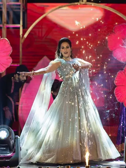 The bride takes center stage in this powerful solo performance, surrounded by backup dancers and dramatic lighting. We choreograph acts that make the bride the undeniable star.