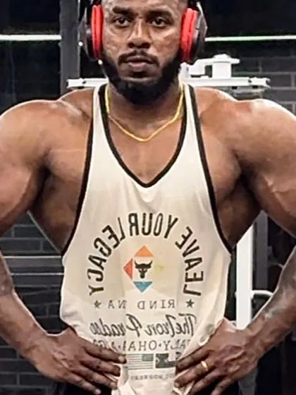 Another shot of my client's impressive bulking phase, showing the size and width he added to his frame.