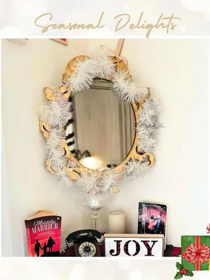 Even our mirrors get a touch of seasonal delight. This vintage mirror is decorated with a white feather boa, adding a touch of festive glamour to the space.