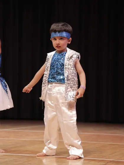 This little guy from the 'Dancing Rockets' is ready for his moment in the spotlight.